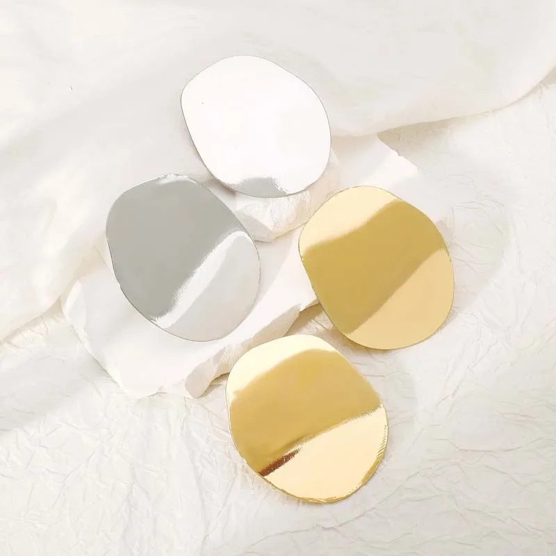 Boucles d'oreilles géométriques en métal lisse