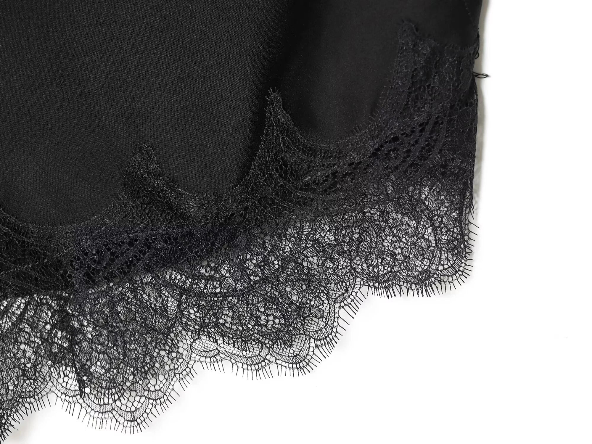 Haut en dentelle asymétrique