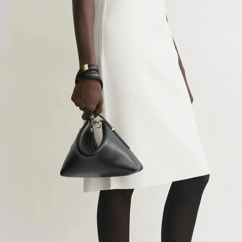 Sacs à bracelets en cuir biseauté