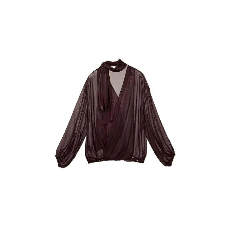 Chemise transparente à manches lanternes