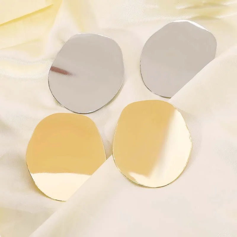 Boucles d'oreilles géométriques en métal lisse