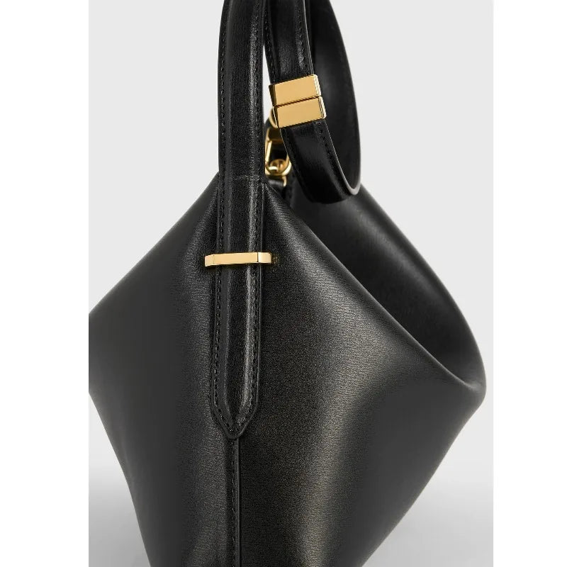 Sacs à bracelets en cuir biseauté