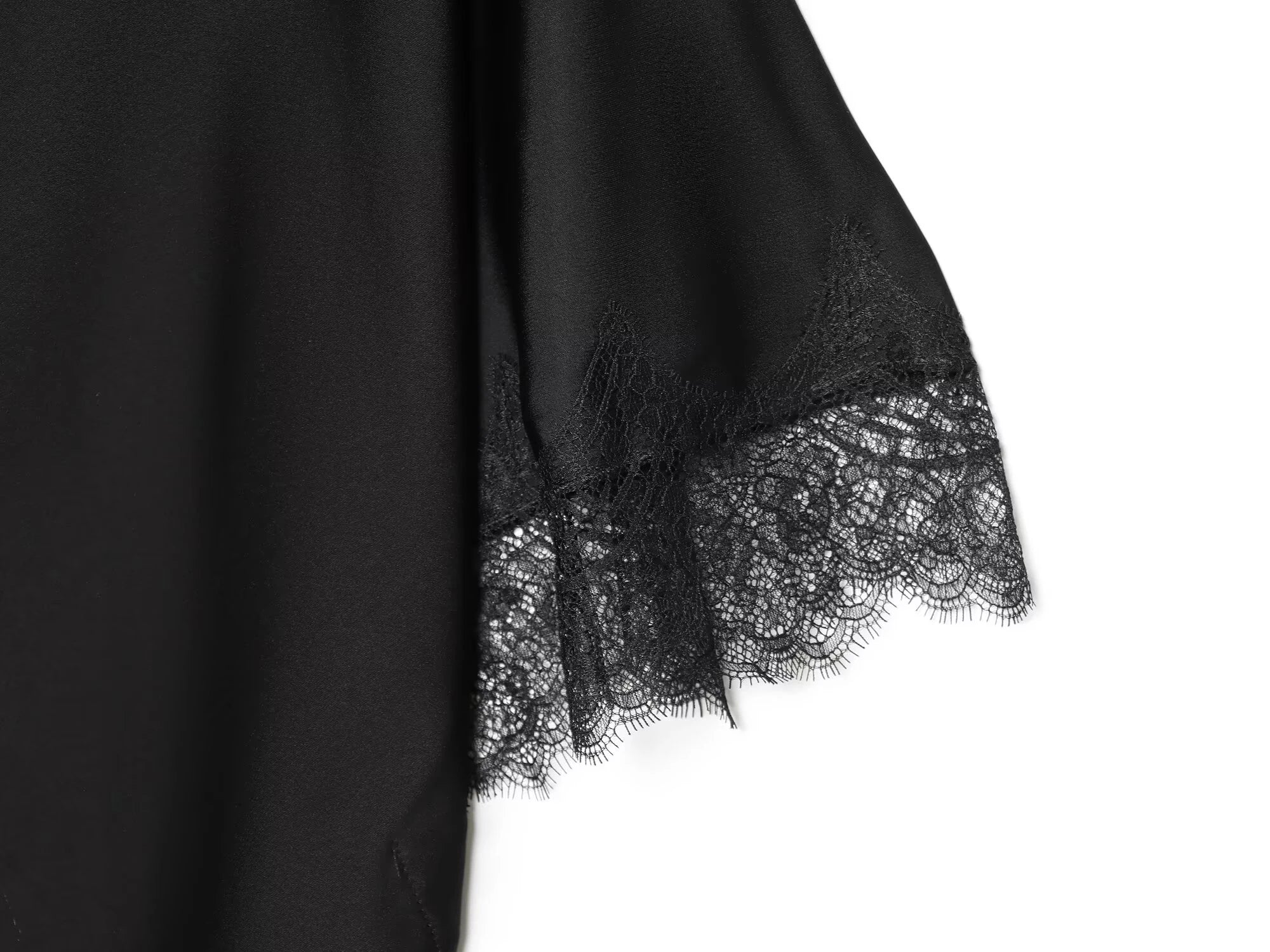 Haut en dentelle asymétrique